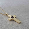 Side view of Nano Bible cross necklace in gold-plated sterling silver. Features a nano-printed chip embedded in the center holding the full King James Version New Testament. Religious Christian jewelry gift for believers seeking a meaningful accessory of faith. Ideal for anniversaries, baptisms, or everyday inspiration.