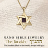 Gold Sacred Fusion Star of David necklace showcased over a Hebrew scripture background. Features nano-inscribed entire Tanakh on a 5mm chip. Nano Bible Jewelry offers a constant connection to spiritual heritage in a timeless design.