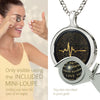 Girl looking thru magnifying glass 24k gold inscribed nanostyle necklace
