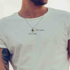 Male Model Wearing Aquarius Necklaces for Lovers of the Zodiac | Inscribed in 24k Gold Zodiac Birthday Jewelry Gift